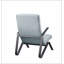 Fauteuil capitonné en tissu bleu clair