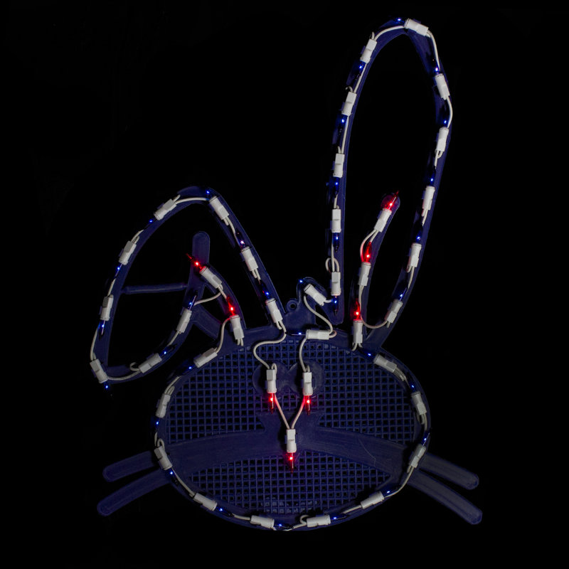 Tête de fenêtre en forme de lapin bleu éclairé de Pâques 17 po