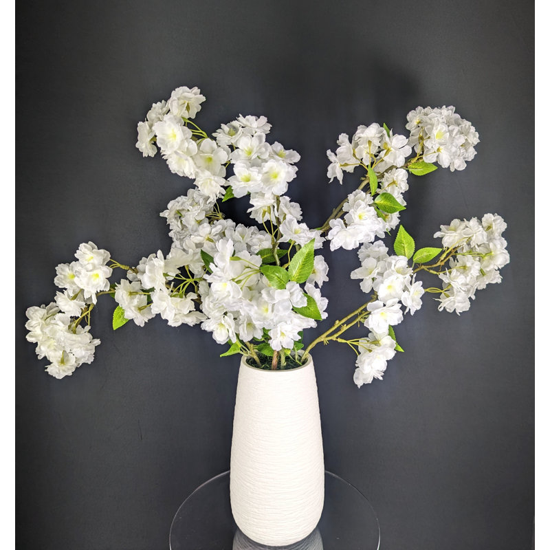 Arrangement floral cerisier en fleurs dans un vase (5 tiges)