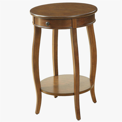 A walnut wood side table with a drawer.