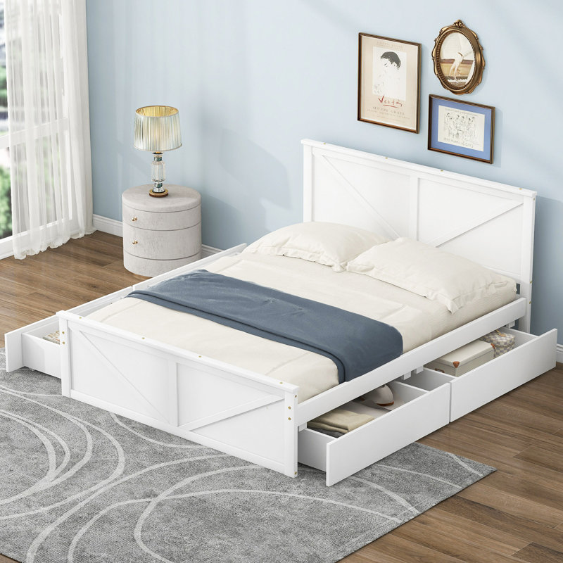 Lit plateforme en bois avec quatre tiroirs de rangement et pieds de support, blanc