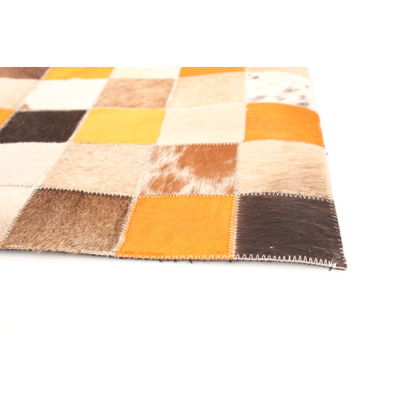 Alasha Cowhide Checkered Indoor Rug