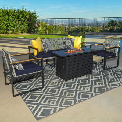 5-Piece Conversation Patio Set with Black Metal Fire Pit table Comes With Black Cushions.