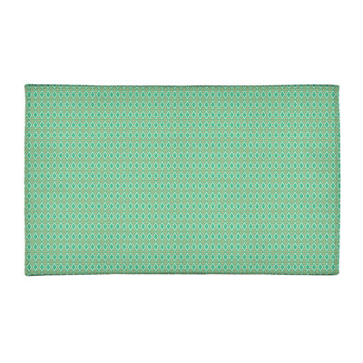 Tapis de couleur verte losanges géométriques