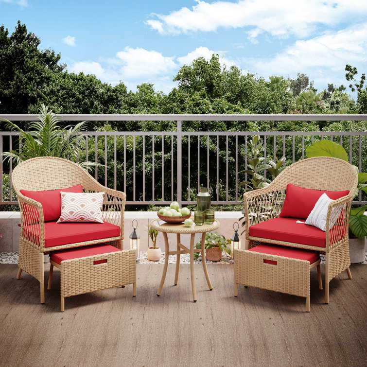 https://assets.wfcdn.com/im/93419638/resize-h755-w755%5Ecompr-r85/2423/242335688/Goosman+5+Piece+Rattan+Seating+Group+with+Cushions.jpg