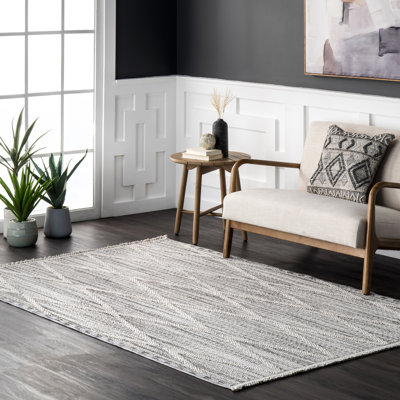 Marcy Geometric Tasseled Area Rug