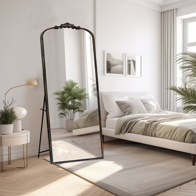 Miroir de plancher arqué antique orné Vinatge