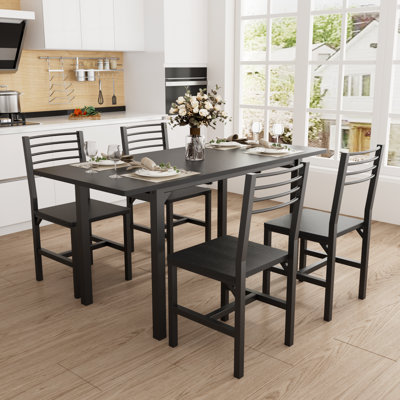 Ensemble de salle à manger extensible 5 pièces, table de salle à manger extensible de 47 à 63 po avec 4 chaises, ensemble de table de cuisine avec panneau en bois aggloméré et structure en métal, pour les petits espaces, noir