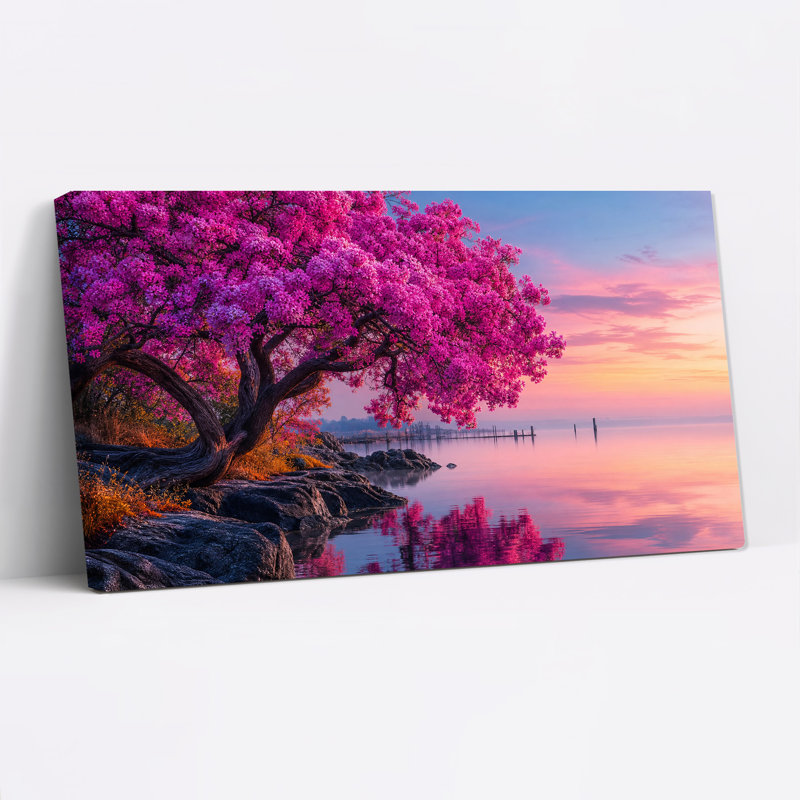 Arbre aux fleurs roses sur un rivage rocheux au coucher du soleil, tableau sur toile, 32"W x 16"H