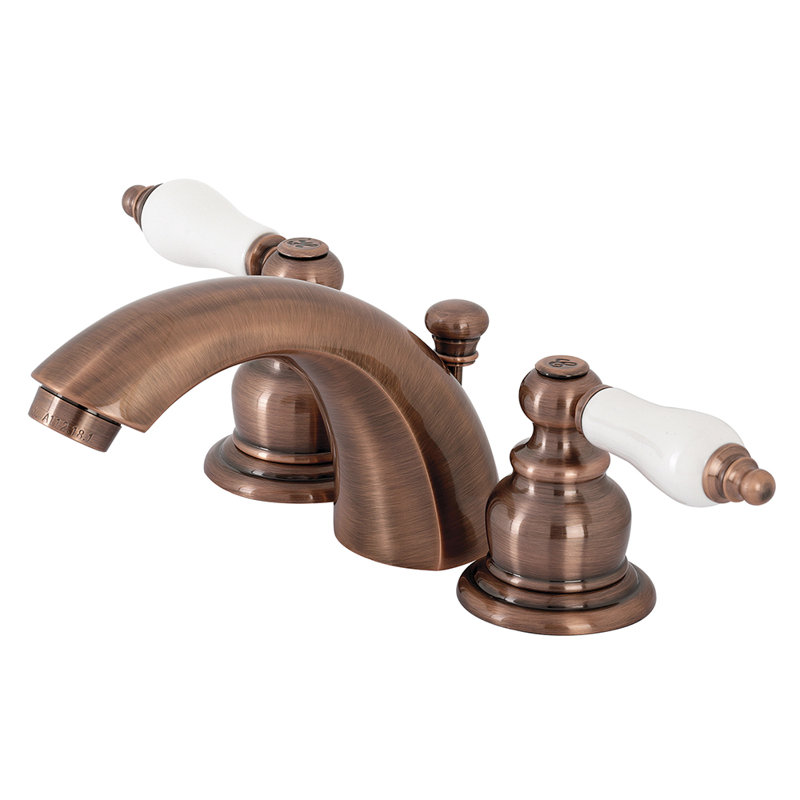Kingston Brass Victorian Two-Handle 3-Hole Deck Mount Mini-Widespread Bathroom Faucet with Plastic Pop-Up, Antique Copper