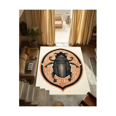 Tapis décoratif noir et beige à motif d'insectes d'inspiration ethnique Waso
