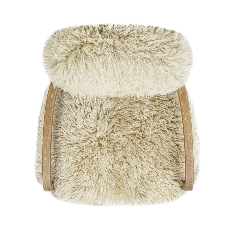 Tripta Upholstered Armchair