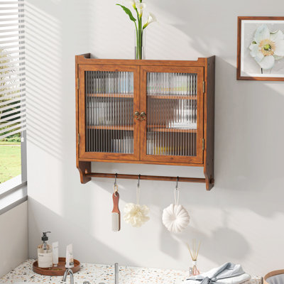 Armoire murale 24,8 "à deux portes avec trois niveaux de rangement et porte-serviettes
