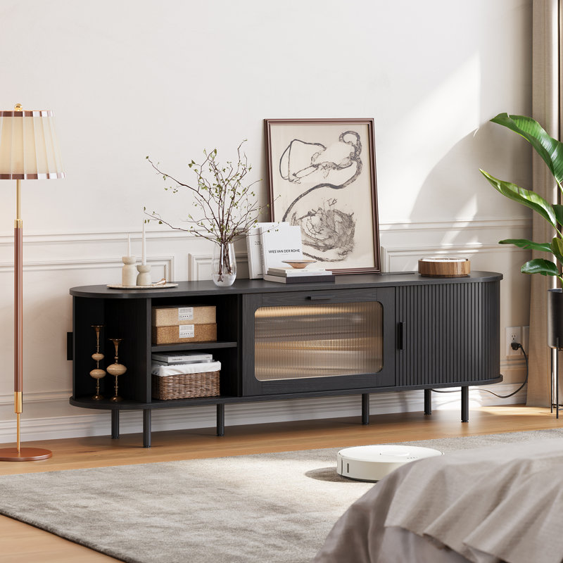 75‘’ W TV Stand for TVs up to  With Fluted Sliding Doors, LED Lights & Hidden Power Strip, Black