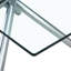 Table rectangulaire moderne avec pieds en verre trempé et en métal argenté pouvant accueillir 4 à 6 personnes, ajoutant du style à la décoration intérieure