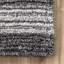 Tapis rayé multicolore gris / brun à poils longs touffeté à la main Panitz-270478303