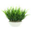 Arrangement extérieur d'herbe certifié UV dans un pot en fibre de pierre