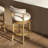 Automatic Return Bar Stool with Curved Design and Nailhead Trim