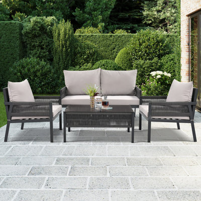 Degnan 4 - Person Outdoor Seating Group with Cushions by Ebern Designs