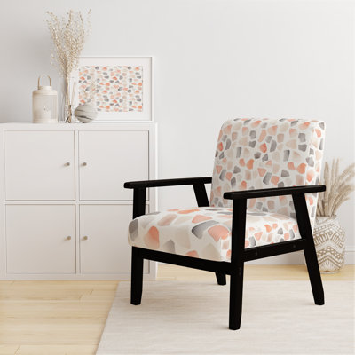 Chaise d'appoint moderne avec accoudoirs noirs aux formes minimalistes en pierre