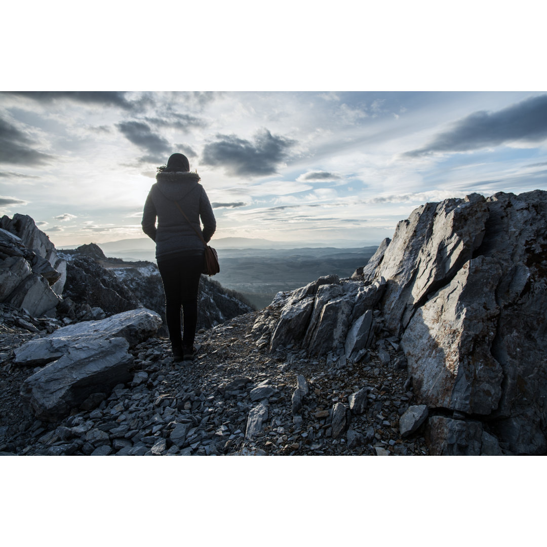 Girl On The Rocky Hill von Fodor90 - Kunstdrucke ohne Rahmen auf Leinwand