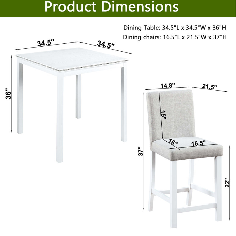 Ensemble table et chaises de salle à manger blanches, hauteur du comptoir, forme carrée avec broderie de cristal. Structure en bois massif. Quatre chaises blanches rembourrées.