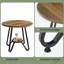 Table basse ronde polyvalente avec une construction durable et une conception compacte, parfaite pour les petits espaces et les usages multiples