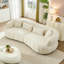 Canapé d'angle moderne incurvé beige effet nuage de 260 cm (102,36 pouces), revêtement en tissu texturé, canapé confortable 4 places-443469588
