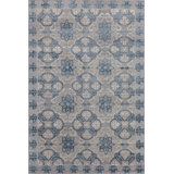 Capistrano Oriental Area Rug in Deep Blue/Silver/Taupe