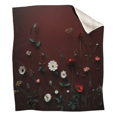 Assorted Wildflowers On Red Blankets