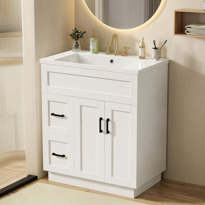 Meuble-lavabo sur pied avec lavabo en résine, tablette réglable, charnières à fermeture douce et rangement dissimulé