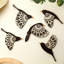 Lot de 5 décorations murales en bois représentant des oiseaux de style folklorique, noir.