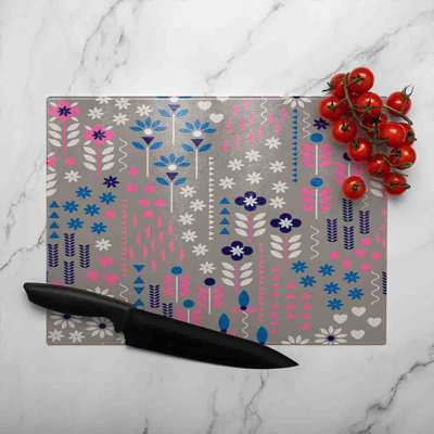 Selection Of Flowers In White Glass Chopping Board