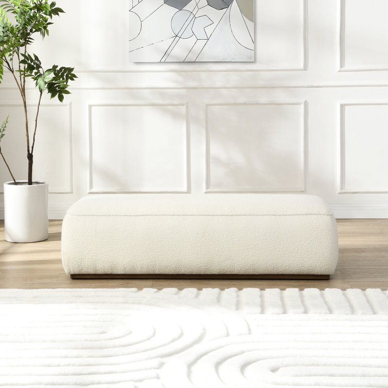 Repose-pieds granuleux beige confortable de 52 pouces, caractéristique du tissu distinctif, utilisation polyvalente dans les espaces domestiques, assise confortable et capacité de charge élevée, caractère unique pour les meubles, usage multiple