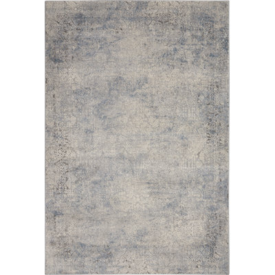 Tapis abstrait gris tissé à la machine