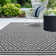 Aaima Patio Black / White Rug