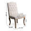 Luxueux ensemble de 2 chaises capitonnées à boutons, alliant confort et style contemporain avec pieds en bois patiné