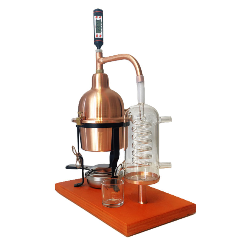 Alembic Distiller For Essential Oils In Copper With Blown Glass Condensation Coil. 0,6 Liters