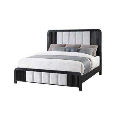 Élégant grand lit noir et blanc avec tête de lit rembourrée moelleuse et conception à profil bas pour les chambres modernes
