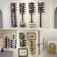 Alaiyah 12 Bottle Wall Mounted Wine Bottle Rack in Brown