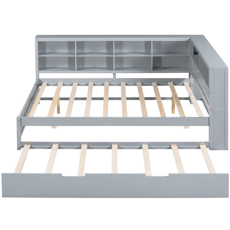 Lit de jour gris en bois pleine grandeur avec lit gigogne escamotable, tablette de rangement et charge, idéal pour une chambre à coucher au design minimaliste