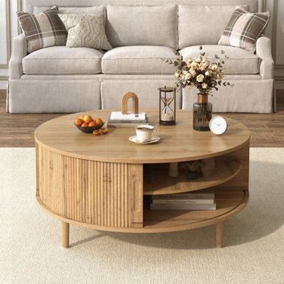 Table basse ronde à plateau relevable avec rangement dissimulé, porte coulissante, pieds en pin