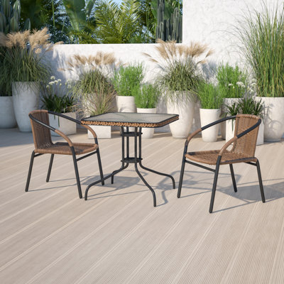 Amlie 28'' Square Glass Metal Table with Rattan Edging and 2 Rattan Stack Chairs