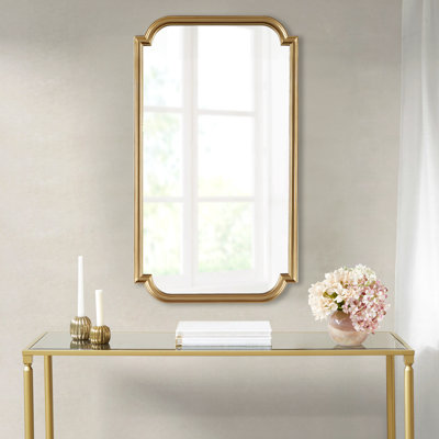 Miroir mural doré