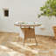 Dubose 4 - Person Wicker Patio Dining Set with Round Table , Cushions Included-963905583