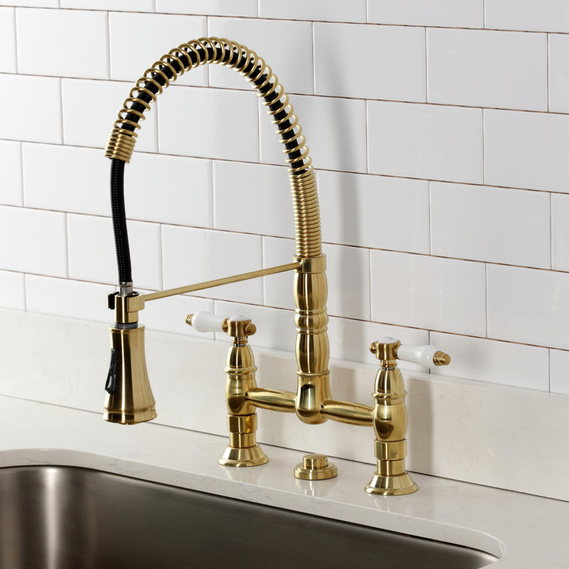 Kingston Brass Bel-Air Double-Handle 2-Hole Deck-Mount Pre-Rinse Bridge Kitchen Faucet, Brushed Brass