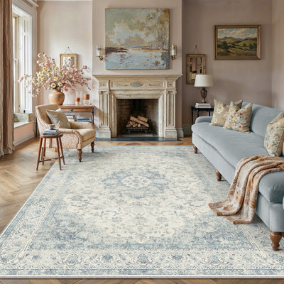 Tapis oriental beige Stella avec envers antidérapant et rouleau