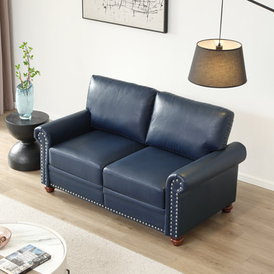 Causeuse de salon avec accoudoirs ronds et canapé à clous argentés et similicuir bleu marine (ce SKU est identique à W1097S00162)