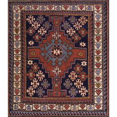Petit tapis noué à la main de style tribal antique