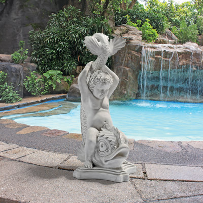 Statue de jardin classique garçon on dauphins